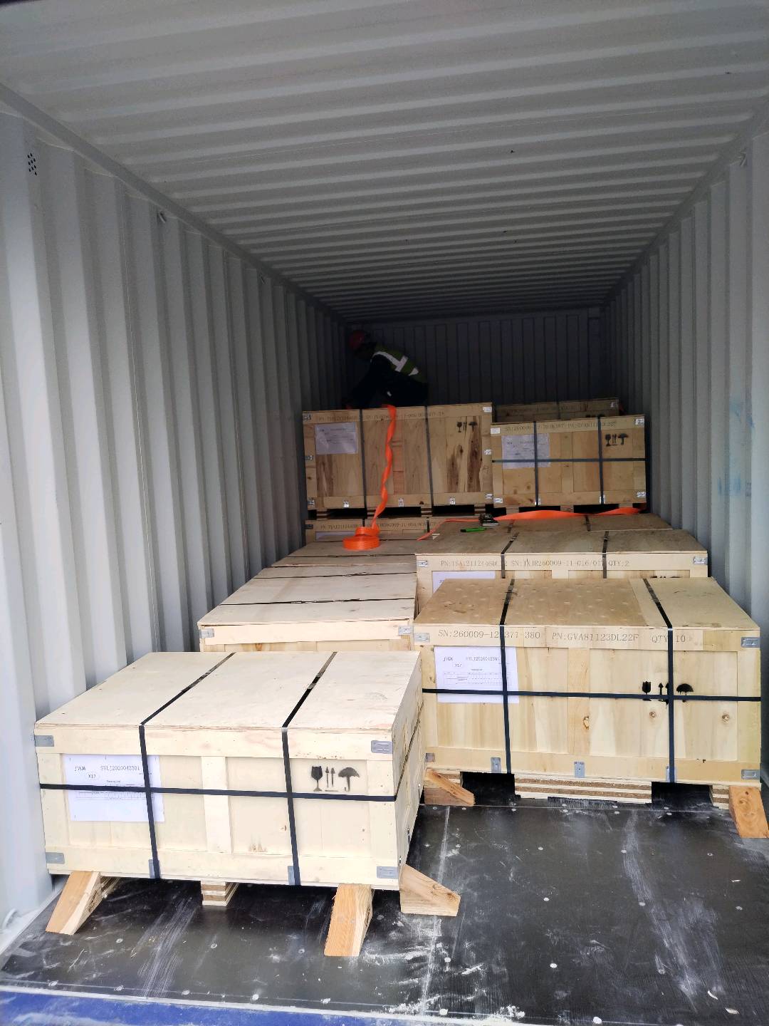 Inside container — devanning crew at work