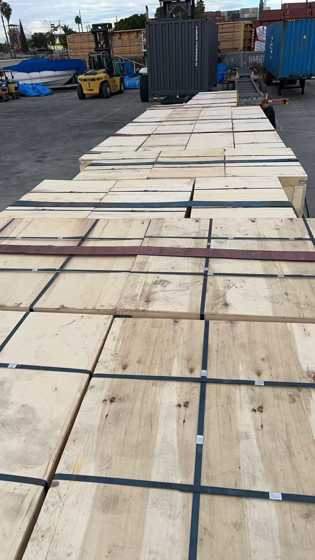 Yard staging — crates ready for transload